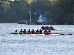 UW eights rowing practice with Bernards boathouse in the distance